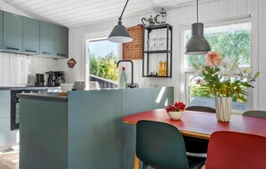 Fridge, stovetop, dishwasher, coffee/tea maker