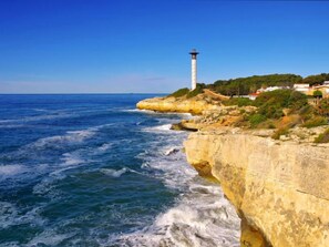 Standing tall on a rocky outcrop, this iconic lighthouse offers breathtaking views of the coastline.