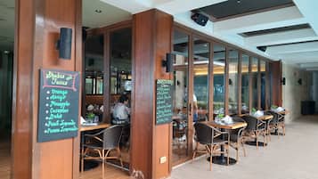 Breakfast, lunch, dinner served; local and international cuisine