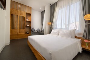 Familjerum | Minibar, mörklÀggningsgardiner, strykjÀrn/strykbrÀda och gratis wi-fi