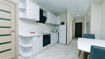 Apartment, 1 Bedroom | Private kitchen | Fridge, microwave, stovetop, electric kettle