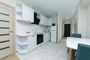 Apartment, 1 Bedroom | Private kitchen | Fridge, microwave, stovetop, electric kettle