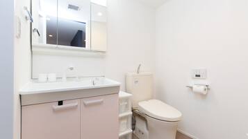 Standard Double Room | Bathroom | Shower, free toiletries, hair dryer, slippers