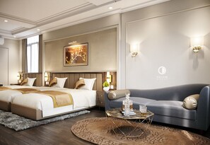 A hotel room with a large bed, a sofa, and a coffee table. There is a painting on the wall and two wall sconces. - An Phu Ha Long Luxury Hotel (Bai Chay)