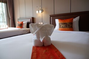 Deluxe Room (No Boat Transfer) | Minibar, in-room safe, desk, laptop workspace - BJ&Radisson Sea View Resort Koh Yao Yai (Ko Yao)