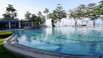 Outdoor pool, pool umbrellas, pool loungers