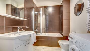 Comfort Apartment | Bathroom | Hair dryer, towels, soap, toilet paper