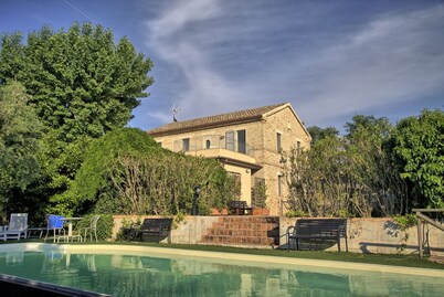 Large historic villa with pool, panoramic views surrounded by greenery