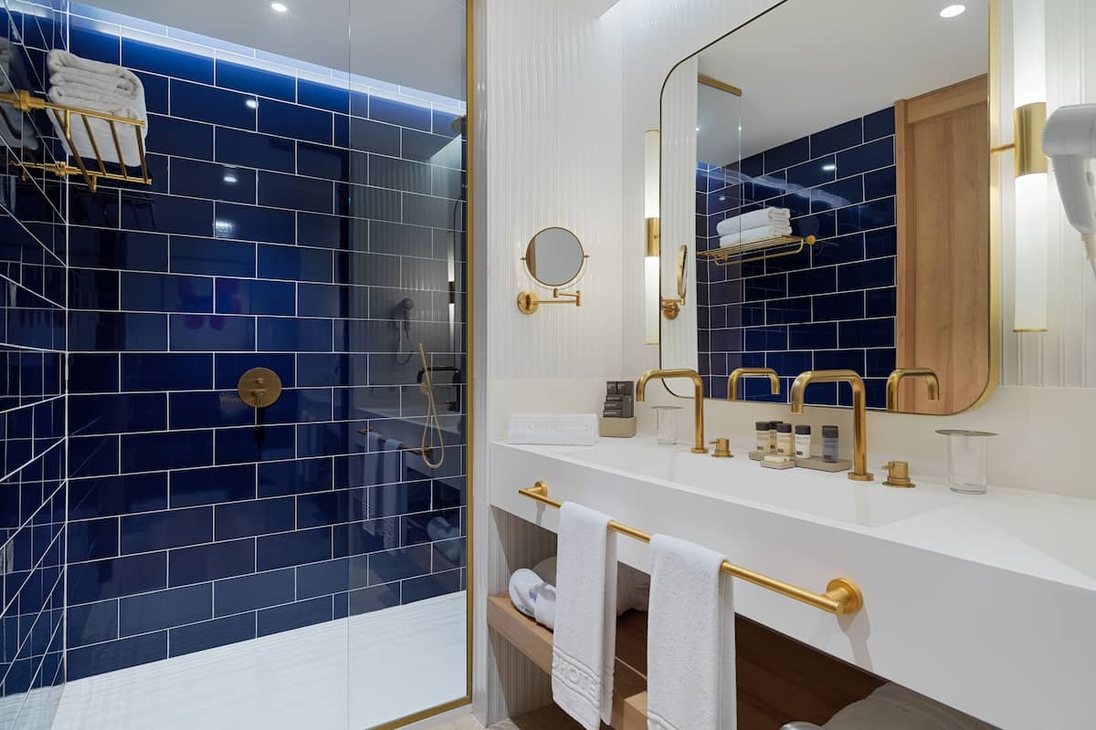 eco-friendly toiletries, hair dryer, towels, soap