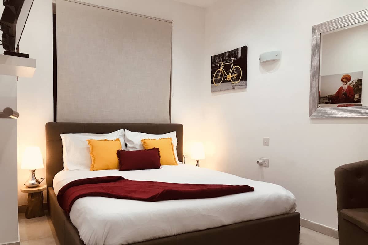 Chambre Double Deluxe | Coffres-forts dans les chambres, rideaux occultants
