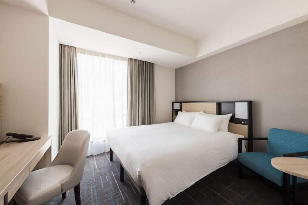 Blackout curtains, iron/ironing board, free WiFi, bed sheets