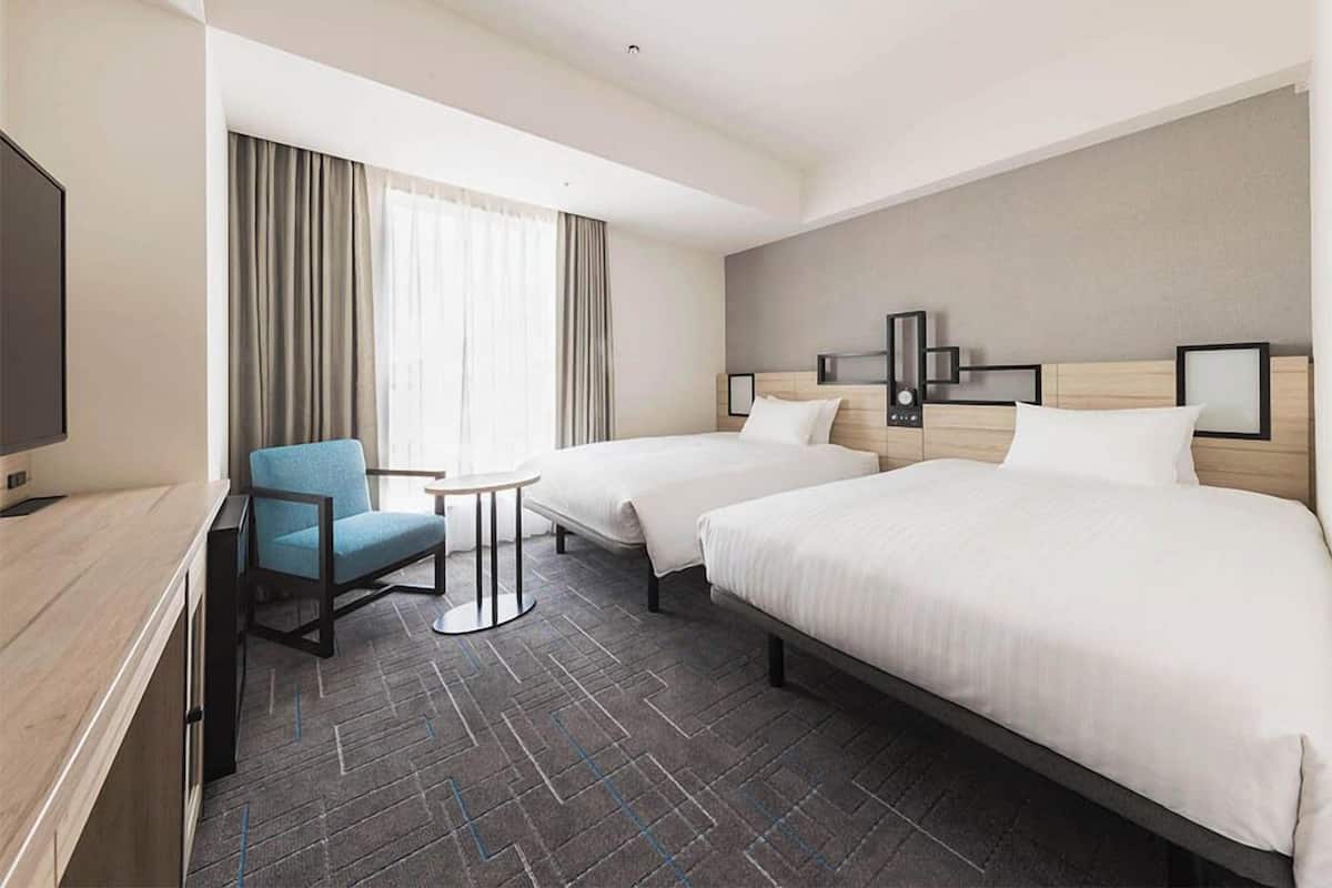 Blackout curtains, iron/ironing board, free WiFi, bed sheets