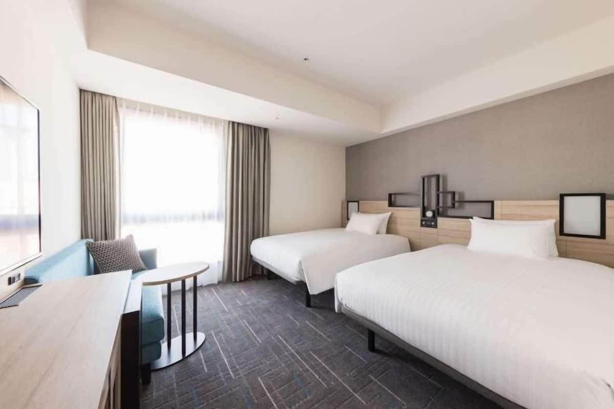 Blackout curtains, iron/ironing board, free WiFi, bed sheets