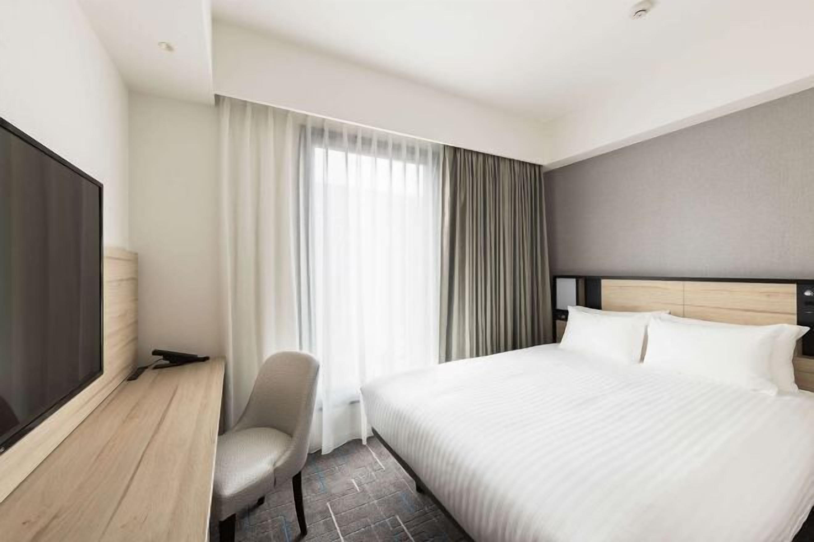 Blackout curtains, iron/ironing board, free WiFi, bed sheets