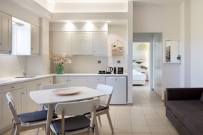 Superior Apartment (with Front View) | Private kitchen | Fridge, stovetop, coffee/tea maker, electric kettle - Forum City Apartments (Chania)