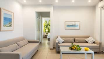 Apartamento superior | Sala de estar | TV de tela plana