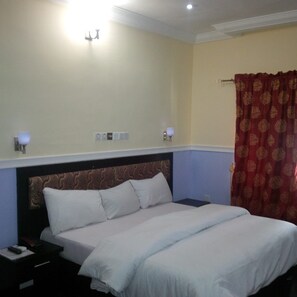 Classic Room | In-room safe, individually decorated, desk, laptop workspace - Lush Suites (Calabar)