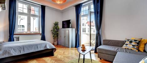 Basic Apartment, 2 Bedrooms | Living room | Flat-screen TV