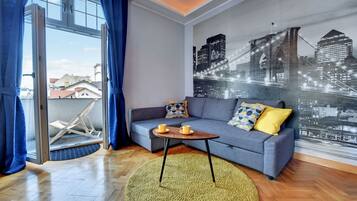 Appartement, 2 chambres | Salle de séjour | Télévision à écran plat