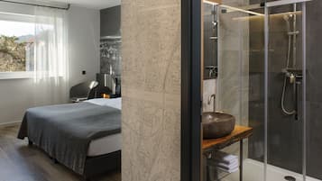 Premium bedding, desk, laptop workspace, soundproofing