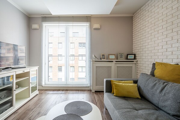 Apartamento conforto | Área de estar | TV de tela plana