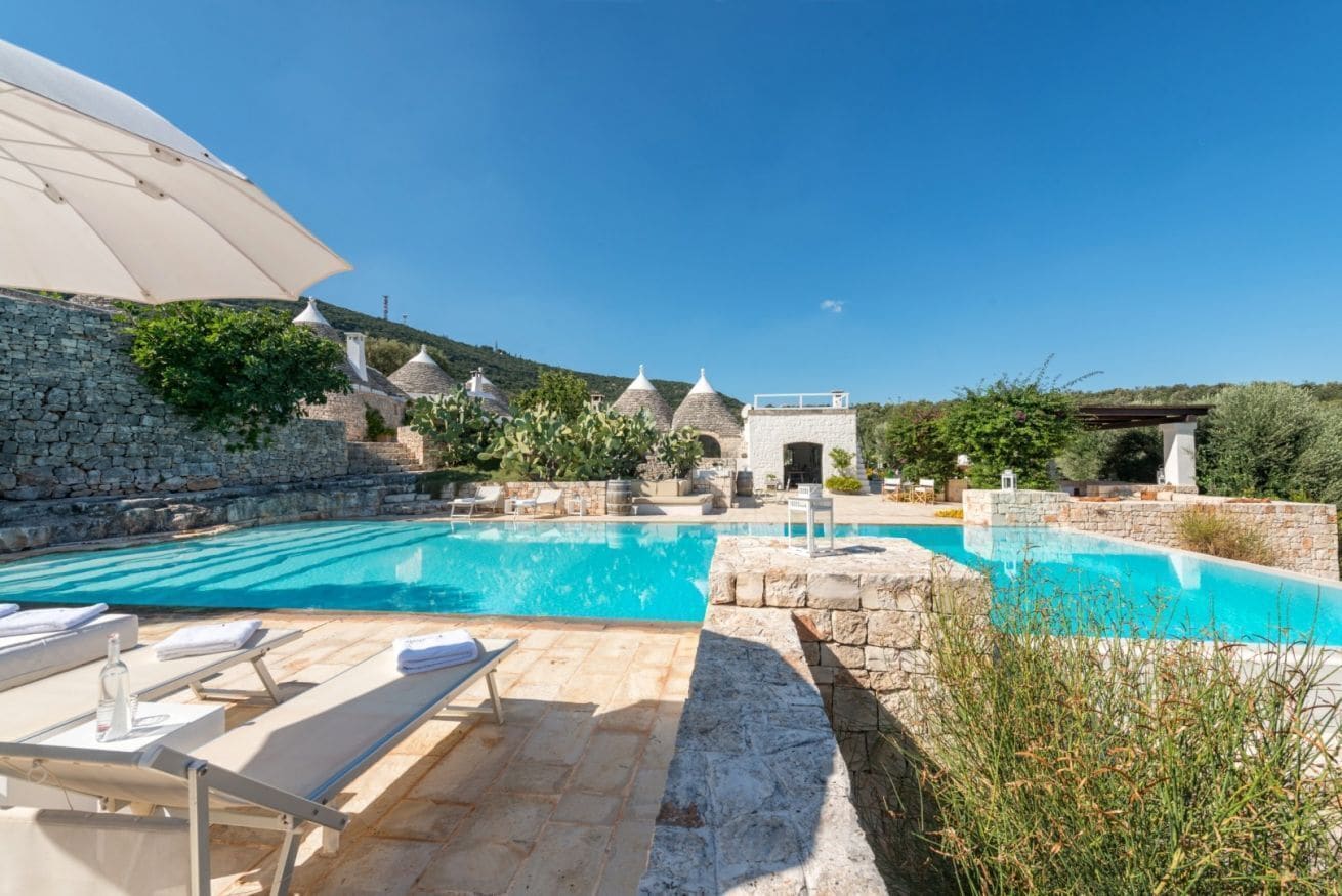 Trulli complex with luxurious infinity pool overlooking the sea
