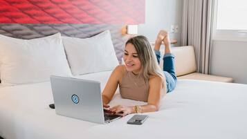 Standard Room, Multiple Beds | In-room safe, desk, laptop workspace, blackout drapes