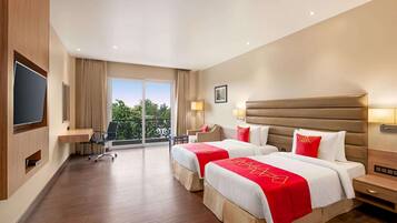 Hypo-allergenic bedding, down comforters, pillowtop beds, minibar