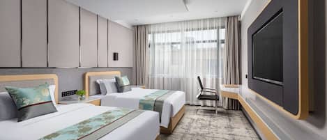 Chambres insonorisées, fer et planche à repasser, draps fournis