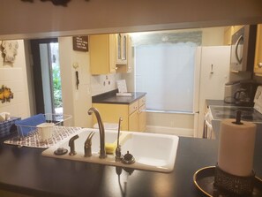 Fridge, microwave, oven, stovetop - Incredible ground floor villa with water views of Bay and waterside pool! (St. Petersburg)