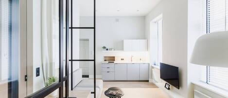 Exclusive-Apartment | Wohnbereich | Fernseher