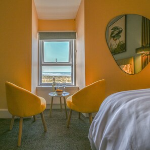 Habitació doble Deluxe, vistes a la platja | Decoració individual i mobiliari individual 