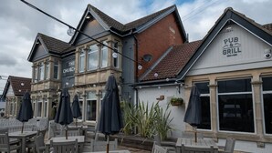 A pub with outdoor seating and a sign reading "PUB & GRILL". - The Churchill By Greene King Inns (Swindon)