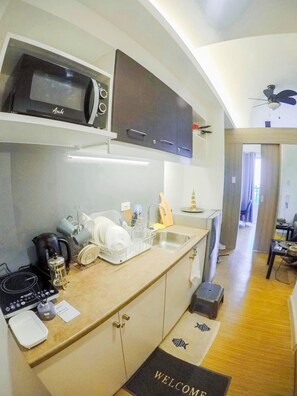 Fridge, microwave, coffee/tea maker, electric kettle