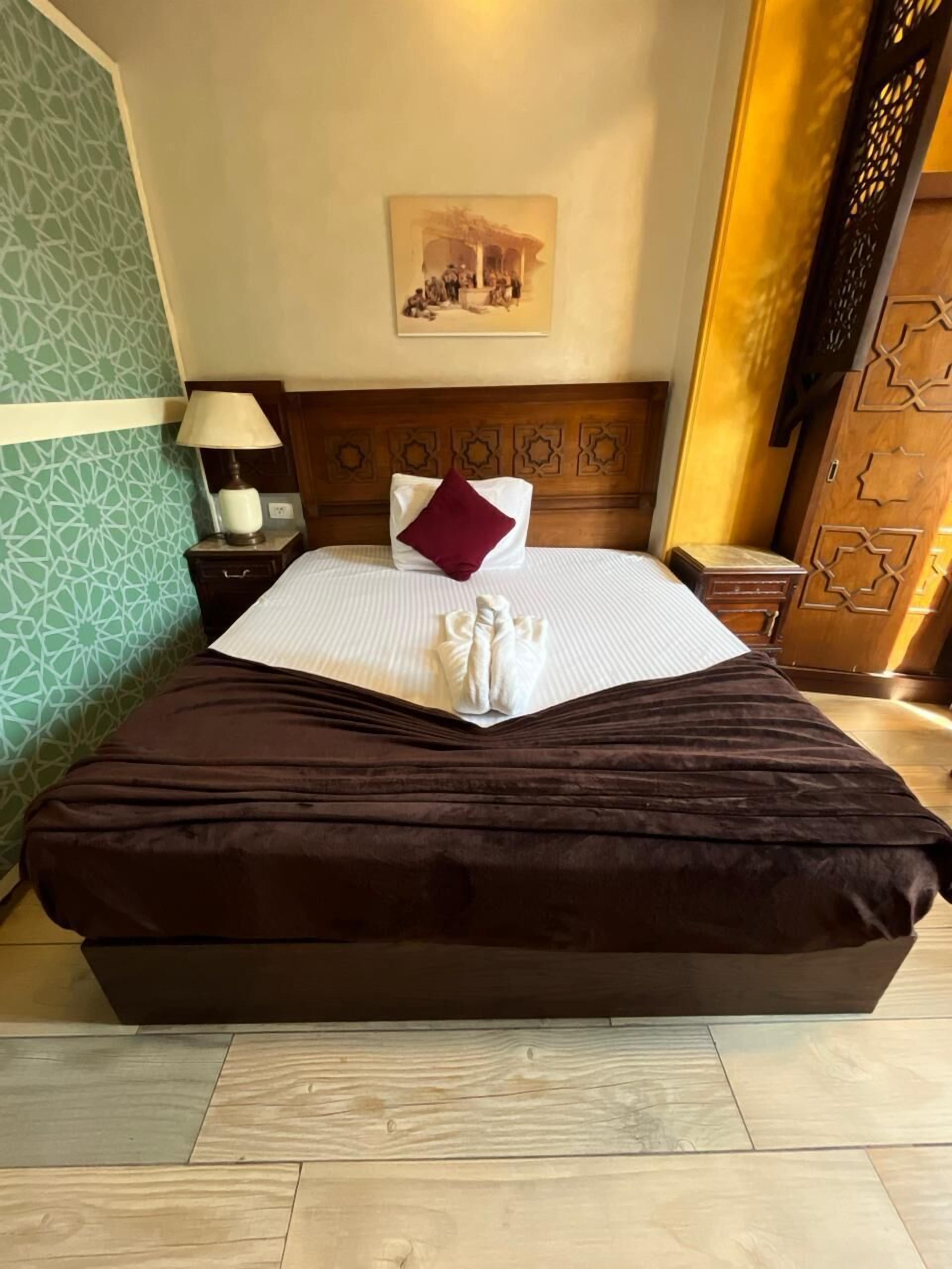 Deluxe Double Room With Extra Bed | Minibar, in-room safe, desk, blackout drapes