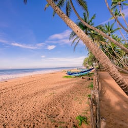 On the beach, white sand, free beach cabanas, sun-loungers