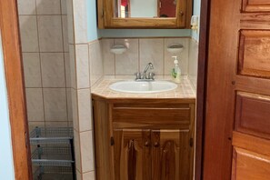 Shower, hair dryer, towels, toilet paper - The Sundial Beach Cabana (Sittee Point)