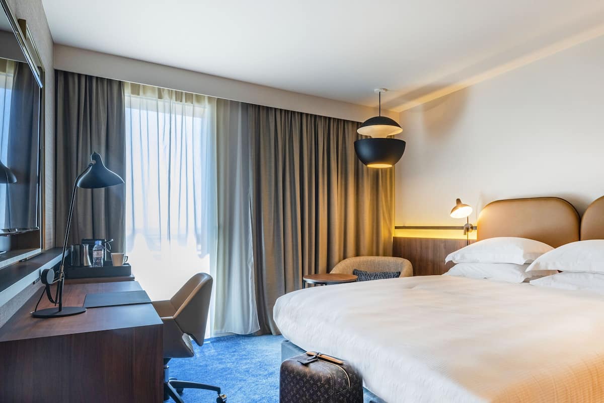 Premium bedding, pillowtop beds, minibar, in-room safe