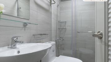 Shower, hair dryer, bathrobes, slippers