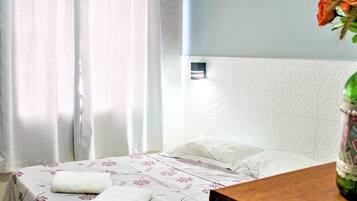 Suíte básica | 1 quarto, Wi-Fi de cortesia, roupa de cama