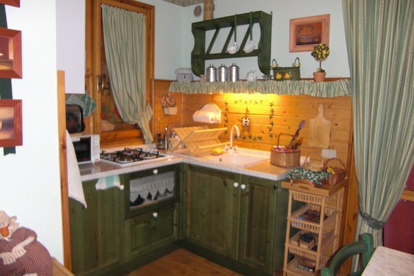 Frigorifero, forno, piano cottura, macchina per tè/caffè