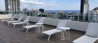 Rooftop Pool with Ocean and City Views