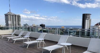 Rooftop Pool with Ocean and City Views