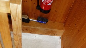 A wooden staircase with a white wall at the top. - Beautiful chalet in 3918 Lauchernalp, Wiler, Valais (Wiler (Lötschen))