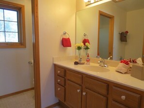 Bathtub, hair dryer, towels