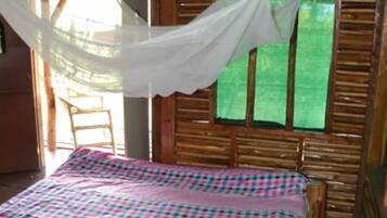 Desk, laptop workspace, iron/ironing board, bed sheets