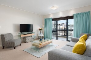 Family Apartment, 2 Bedrooms (Manhattan 1008) | Living area | Flat-screen TV
