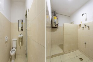 Quarto standard | Banheiro | Chuveiro, produtos de toalete grátis, toalhas de banho