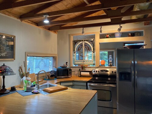 Lake Pokegama recreational cabin with private sandy beach and diving platform.