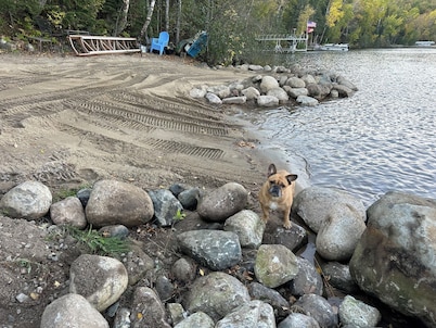 Lake Pokegama recreational cabin with private sandy beach and diving platform.